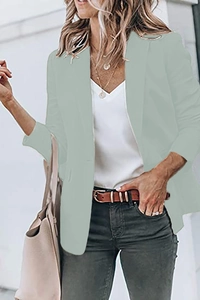 Detail of mint green long-sleeved casual blazer for women with classic lapel design