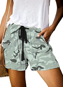 Detail of high waist camouflage shorts with elastic waistband and black drawstring