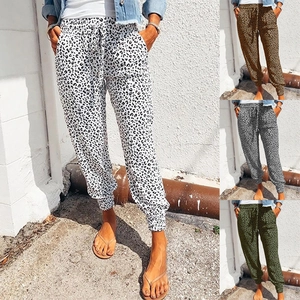 Detail view of drawstring waistband and leopard print patterns on summer jogger pants