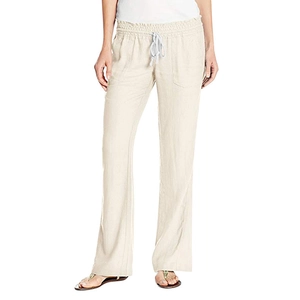 Detail of the elastic waistband and gray drawstring on light beige linen trousers