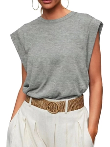 Detail of grey sleeveless T-shirt with shoulder pads showing fabric texture and round neck