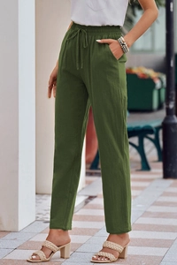 Detail of army green cotton linen wide-leg pants with elastic drawstring waist and side pockets