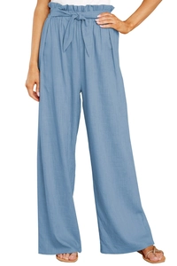 Detail view of high paper bag waist and fabric belt on blue linen wide-leg trousers