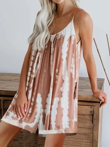 Detail of brown and white tie-dye sleeveless romper with thin straps and V-neckline