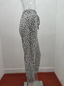 Detail of high waist leopard print jogger with adjustable drawstring and side pockets