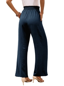 Vista posteriore dei pantaloni larghi blu navy a vita alta con elastico e tasche laterali