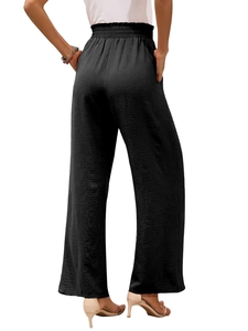 Vista posteriore dei pantaloni neri a vita alta con fascia elastica e tessuto strutturato