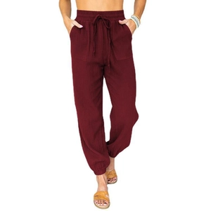 Women's high waist drawstring cargo joggers in deep red with large side pockets