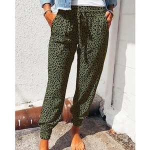 Women's olive green leopard print joggers with drawstring waist and loose fit style