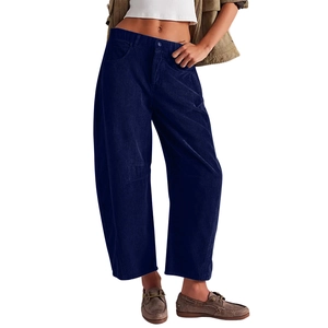 Close-up of high-waist corduroy wide-leg pants in deep blue with classic ribbed texture