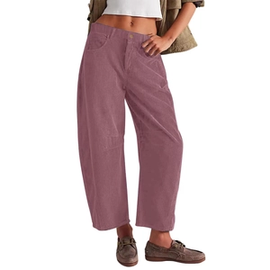 Close-up detail of women's high-waist corduroy wide-leg trousers in mauve pink