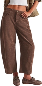 Detail of high-waist brown corduroy pants featuring a button waist and ribbed texture