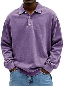 Detail of vintage washed purple long sleeve polo shirt with three-button placket and collar