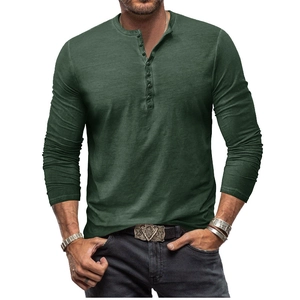 Close-up of vintage dark green Henley shirt featuring slub texture and buttoned V-neckline