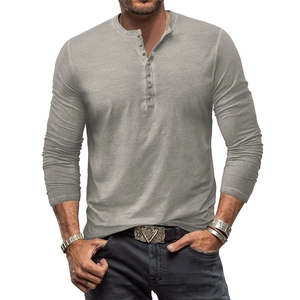 Detail shot of men's slim fit henley shirt with vintage washed texture and five-button neck