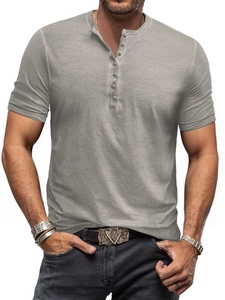 Detail of the multi-button Henley neckline and light grey vintage fabric texture for men
