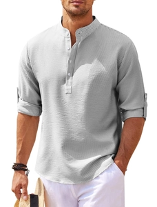 Detail of grey waffle knit henley shirt with stand collar and buttoned sleeve tabs