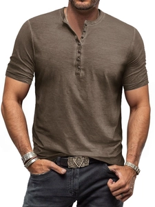 Detail of vintage washed earth-tone Henley shirt with five-button placket and textured fabric