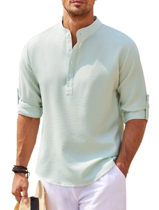 Detail of light green waffle knit fabric and three-button henley collar on men's shirt