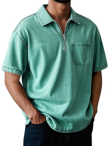 Detail view of men's polo shirt featuring vintage acid wash fabric and half-zip collar