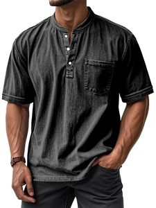 Detail of dark grey henley shirt featuring white buttons and a left chest pocket