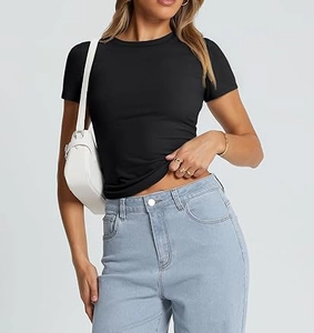 Detailed view of women's black slim fit crew neck short sleeve tee with white shoulder bag