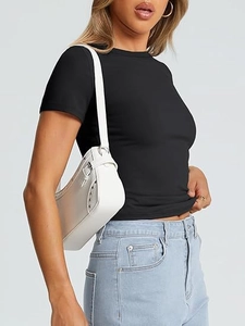 Close-up of slim fit black crew neck t-shirt with ribbed texture and white rivet bag
