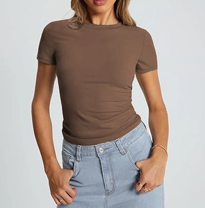 Detail of slim fit brown crew neck t-shirt showing soft ribbed fabric and stitch quality