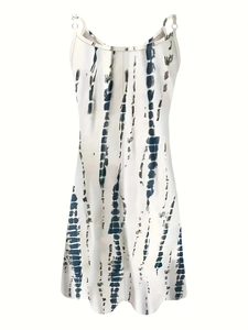 Detail of white off-shoulder summer dress featuring vertical tie-dye stripe patterns