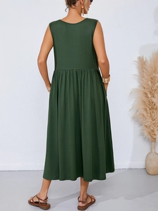 Rear view of dark green sleeveless midi dress featuring elastic high waist and side pockets