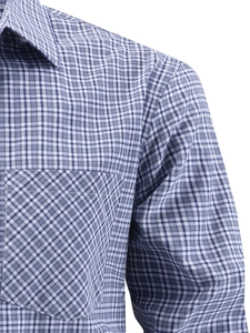 Detail of blue gingham checkered shirt with classic collar and reinforced chest pocket