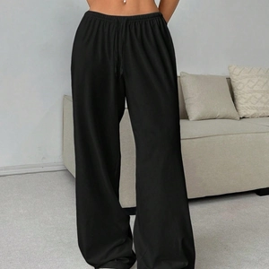 Women's black high-waisted wide-leg sweatpants with drawstring and elastic waist