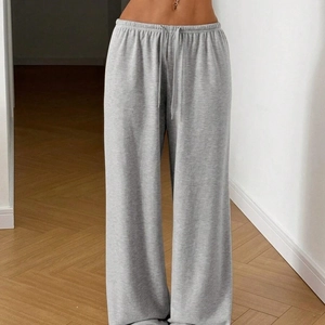 Women's grey lightweight drawstring sweatpants with wide leg and straight fit design