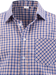 Detail of blue and orange plaid shirt pocket with US size M tag on collar