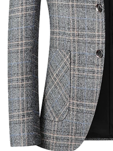 Detail of grey plaid blazer showing fine fabric texture and premium buttons close-up