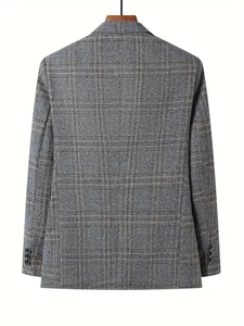 Detail view of the back of a men's grey plaid suit jacket with three cuff buttons