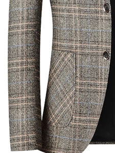 Detail of men's casual plaid blazer showing gray patch pocket and button texture