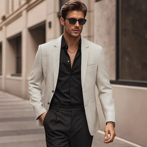 Men's light grey textured blazer with black shirt and trousers for a modern urban look