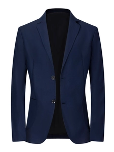 Detail of single-breasted navy blazer with notch lapel and flap pockets for men