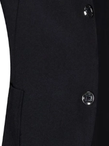 Detailed close-up of textured silver buttons on a black business casual blazer jacket