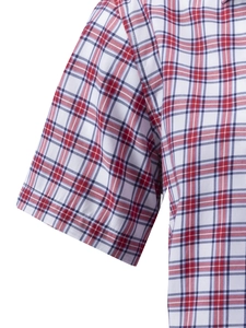 Detailed view of red and navy blue plaid shirt sleeve with high-quality stitching