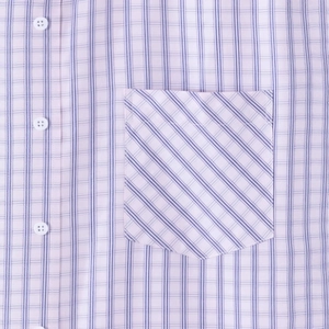 Short sleeve plaid shirt featuring a chest pocket with 45-degree diagonal stripe detail
