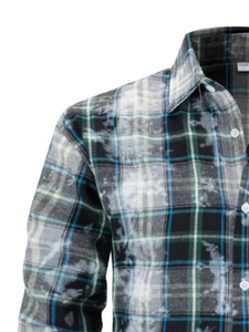 Detail of men's casual striped long sleeve shirt with vintage bleach wash effect