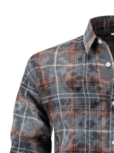 Detail of grey and brown flannel checkered shirt showing collar and fabric texture