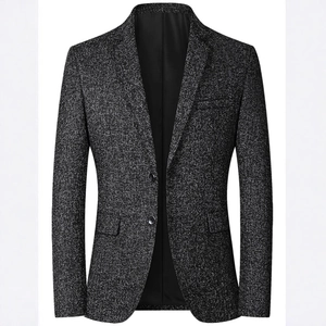 Men's slim-fit dark grey tweed blazer with two-button closure and classic flap pockets