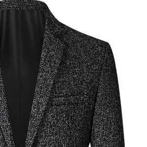 Men's casual blazer with black and white speckled texture and peak lapels