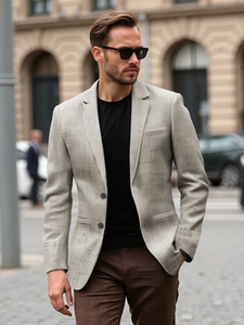 Detailed view of oatmeal blazer texture with two-button design and premium stitching