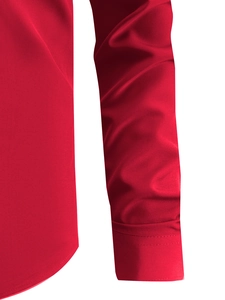 Detail of red business shirt cuff featuring fine stitching and silky stretch fabric texture