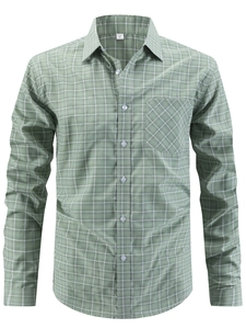 Detail shot of men's grey-green plaid shirt with front pocket and button-down collar