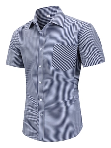 Detail of blue and white gingham short sleeve shirt showing standard collar and chest pocket